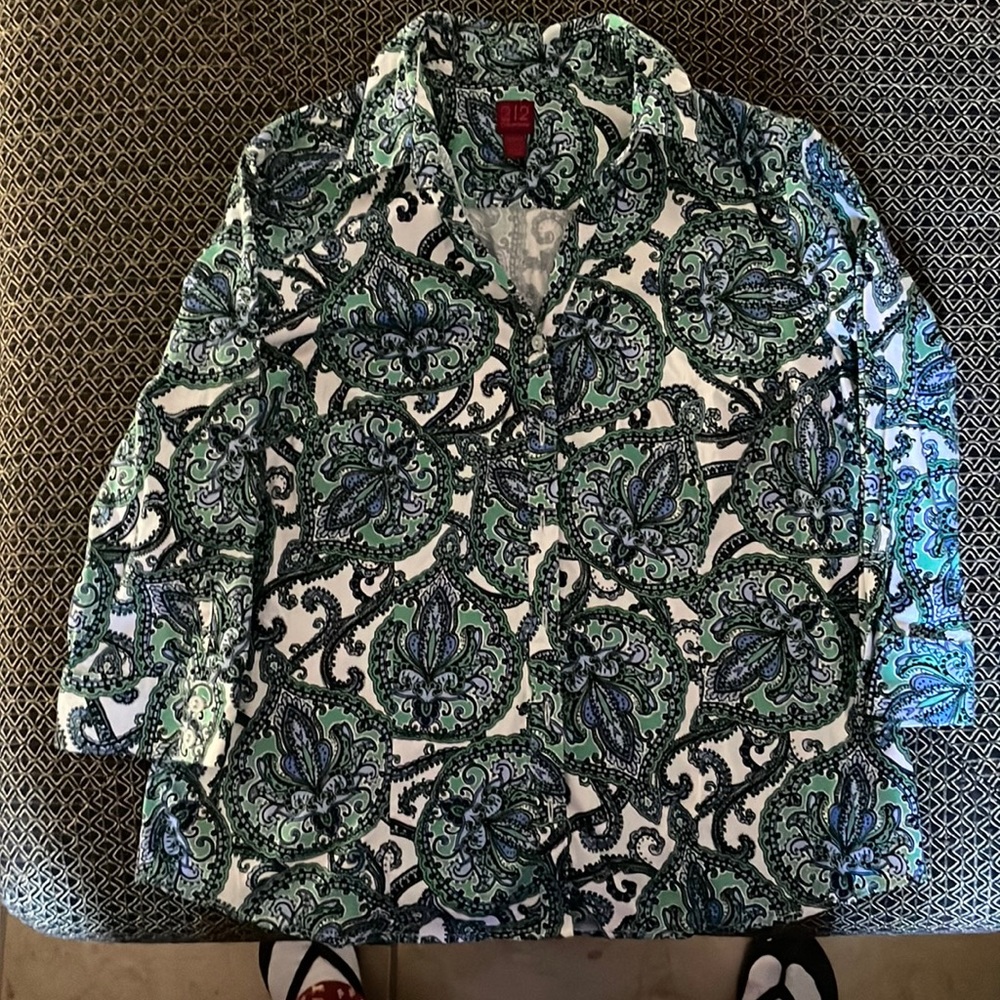 Mid length collared, button down top